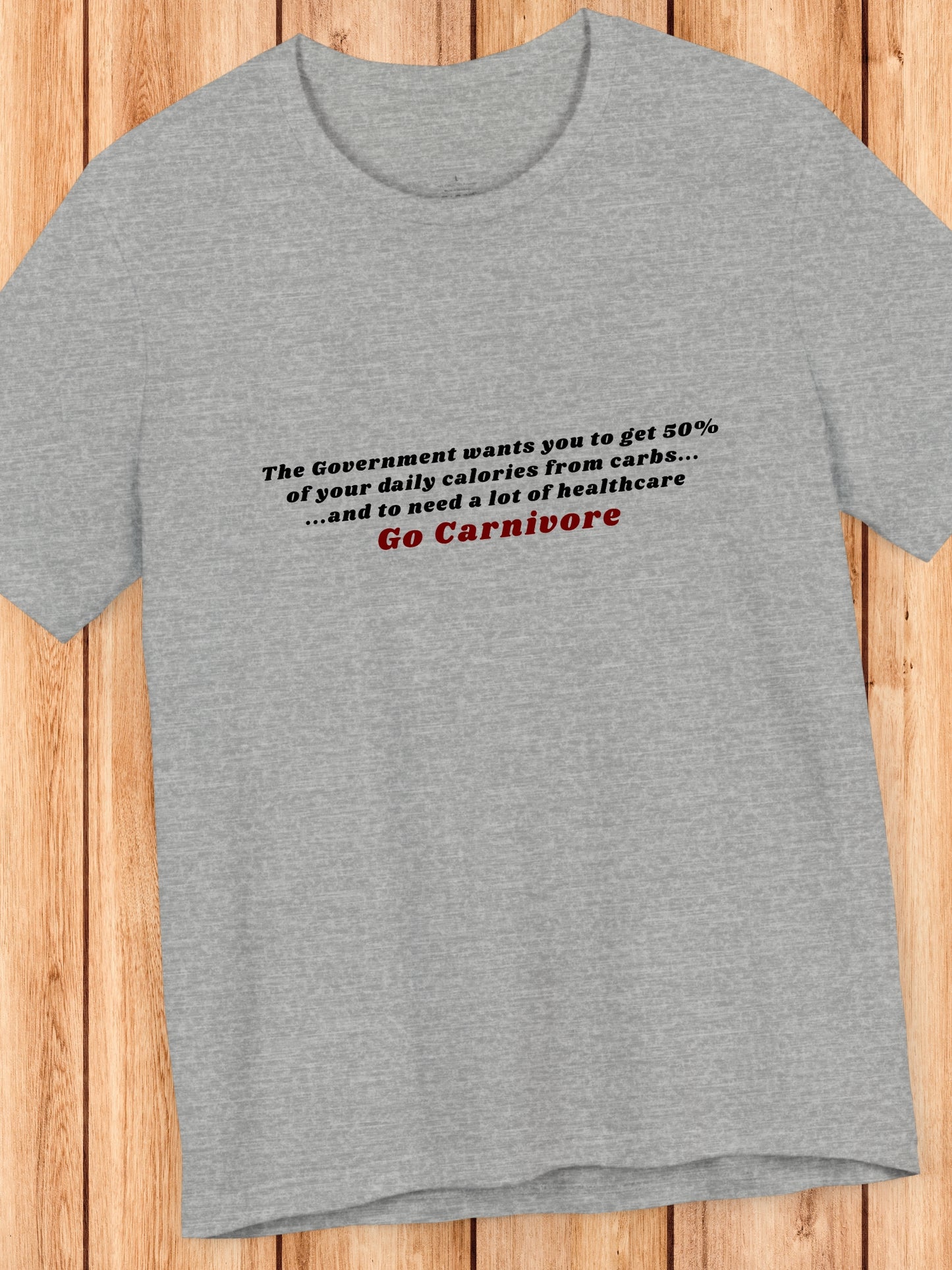 'The Government wants you to get 50% of your daily calories from carbs... and to need a lot of healthcare, Go Carnivore' Unisex T-Shirt, Health and Wellness, Carnivore Diet Apparel