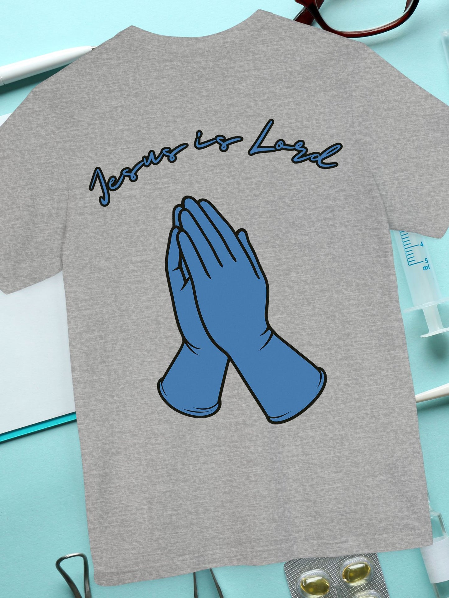 Praying Hands Medical Gloves "Jesus is Lord" Tee - Unisex Jersey Short Sleeve Shirt, Casual Wear, Gifts for Friends