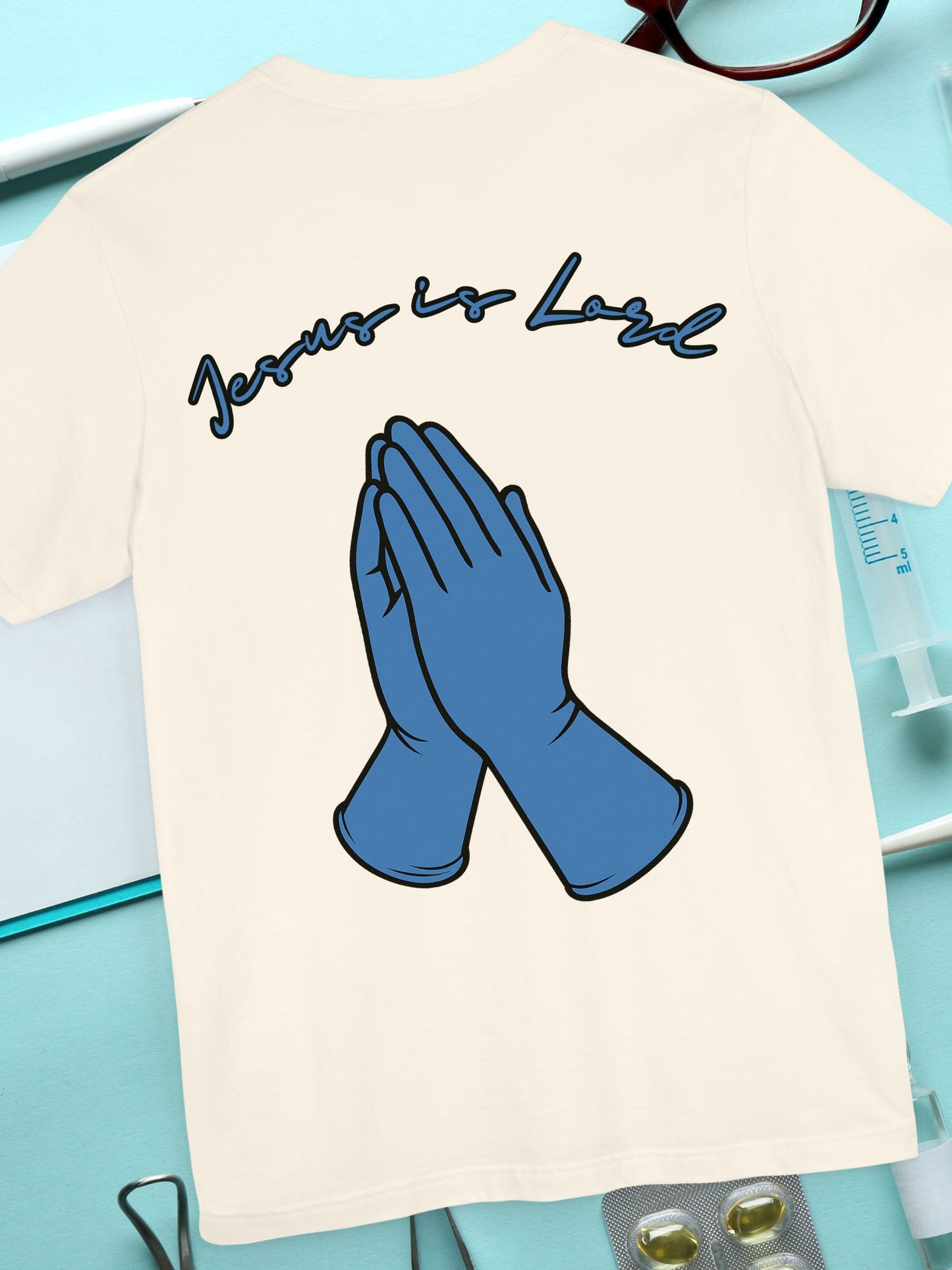Praying Hands Medical Gloves "Jesus is Lord" Tee - Unisex Jersey Short Sleeve Shirt, Casual Wear, Gifts for Friends