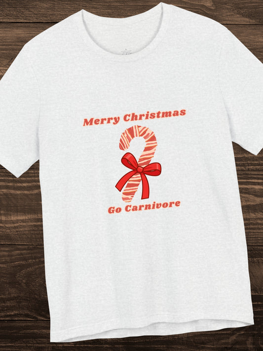 'Merry Christmas, Go Carnivore' Bacon Wrapped Candy Cane Graphic Unisex T-Shirt, Carnivore Diet Apparel, Health and Wellness, Holiday Greetings