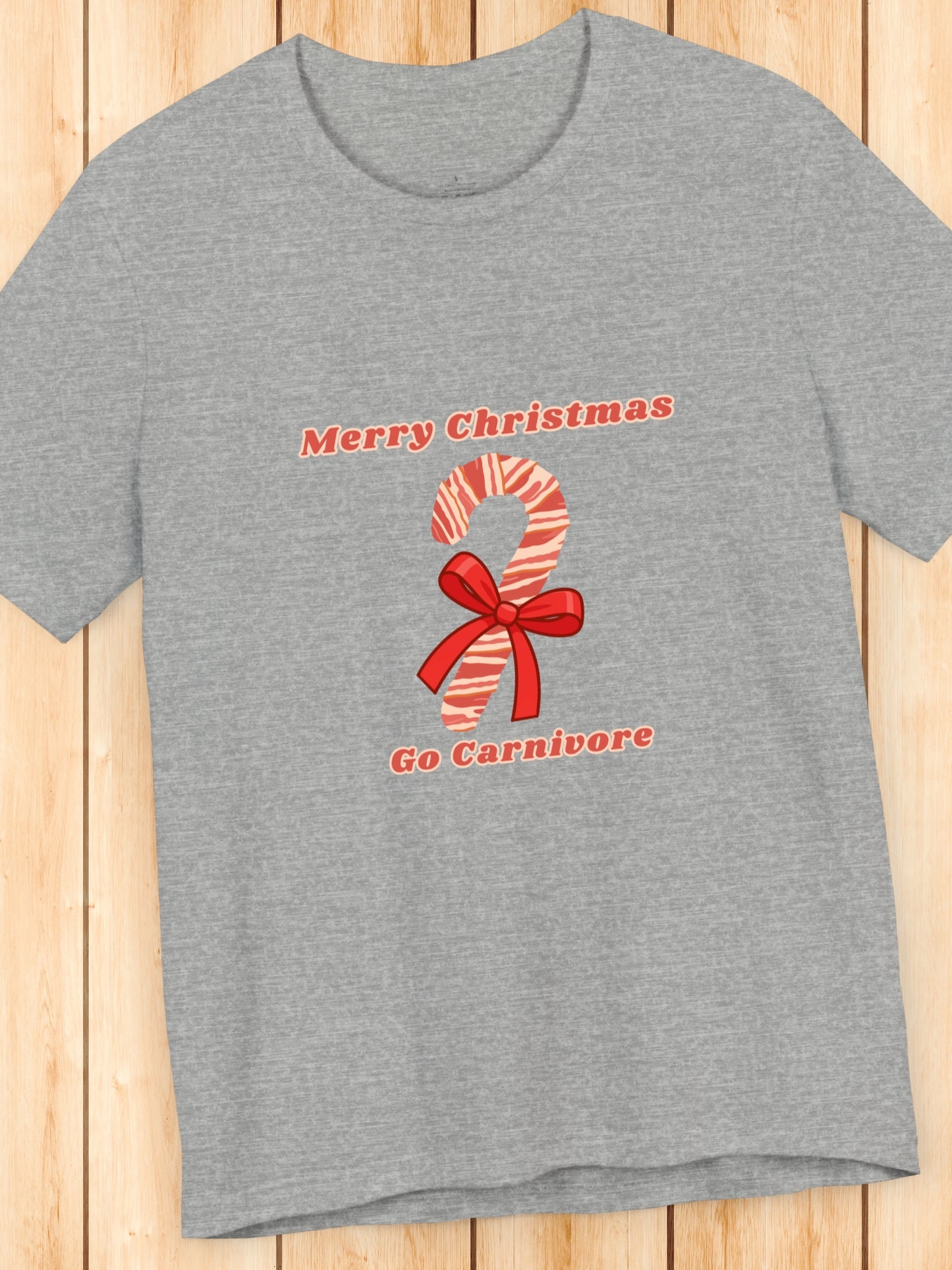'Merry Christmas, Go Carnivore' Bacon Wrapped Candy Cane Graphic Unisex T-Shirt, Carnivore Diet Apparel, Health and Wellness, Holiday Greetings