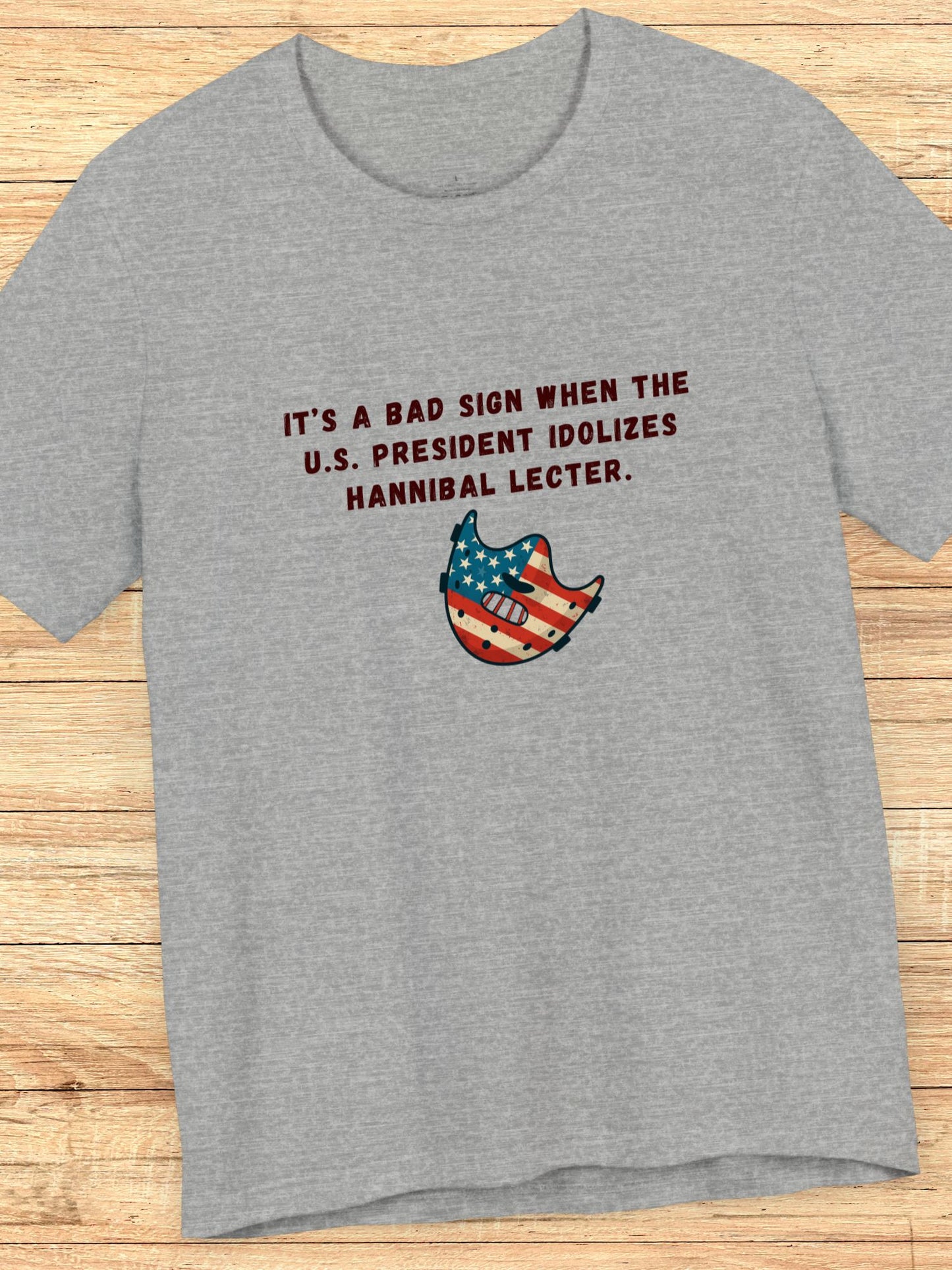 'It’s a Bad Sign When the U.S. President Idolizes Hannibal Lecter.' US Flag Lecter Mask Graphic Unisex T-Shirt, Political Tee