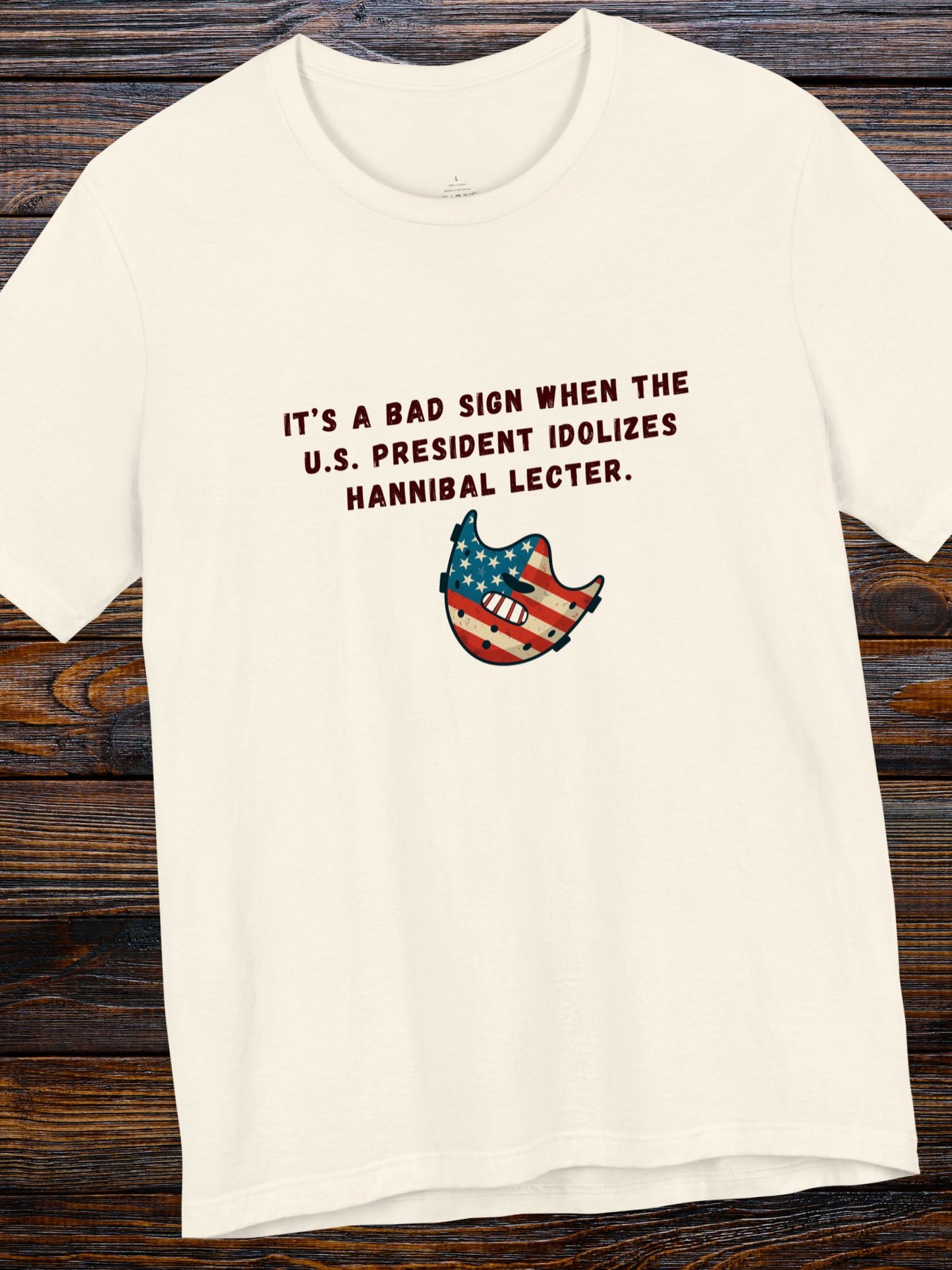 'It’s a Bad Sign When the U.S. President Idolizes Hannibal Lecter.' US Flag Lecter Mask Graphic Unisex T-Shirt, Political Tee