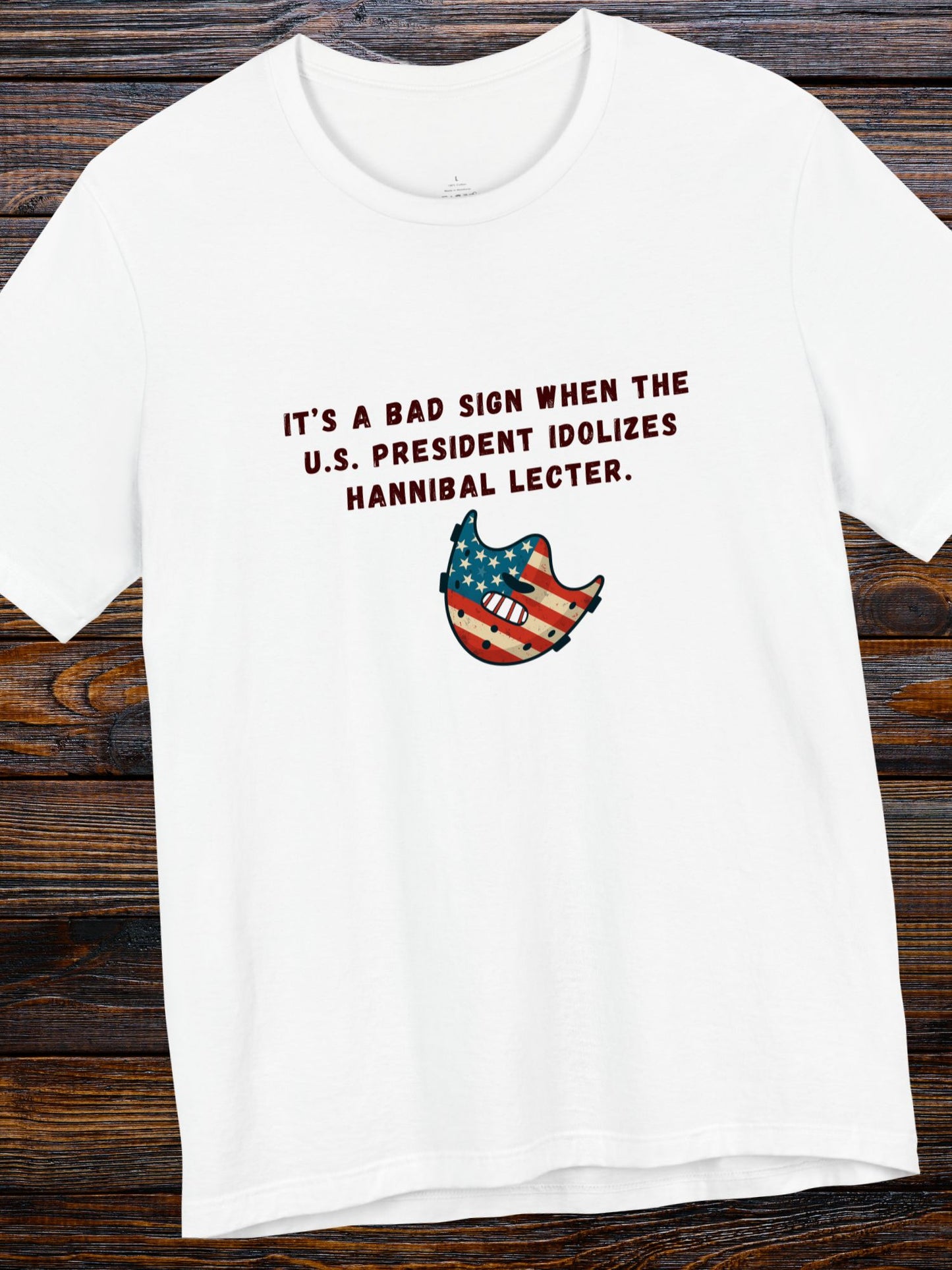 'It’s a Bad Sign When the U.S. President Idolizes Hannibal Lecter.' US Flag Lecter Mask Graphic Unisex T-Shirt, Political Tee