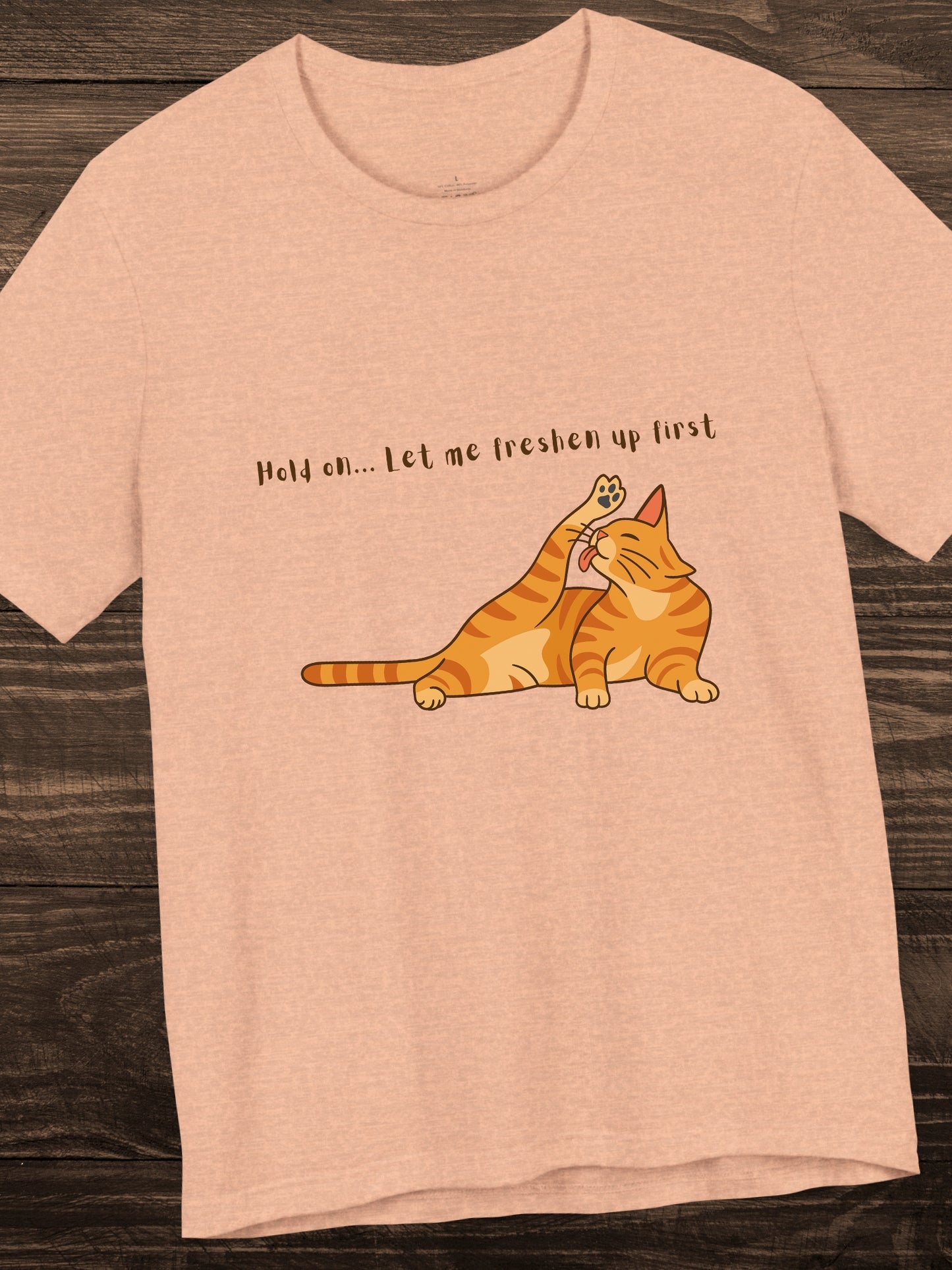 'Hold on... Let me freshen up first' Cat Cleaning Itself Graphic Unisex T-Shirt, Cat Lovers Tee, Funny Cat Shirt