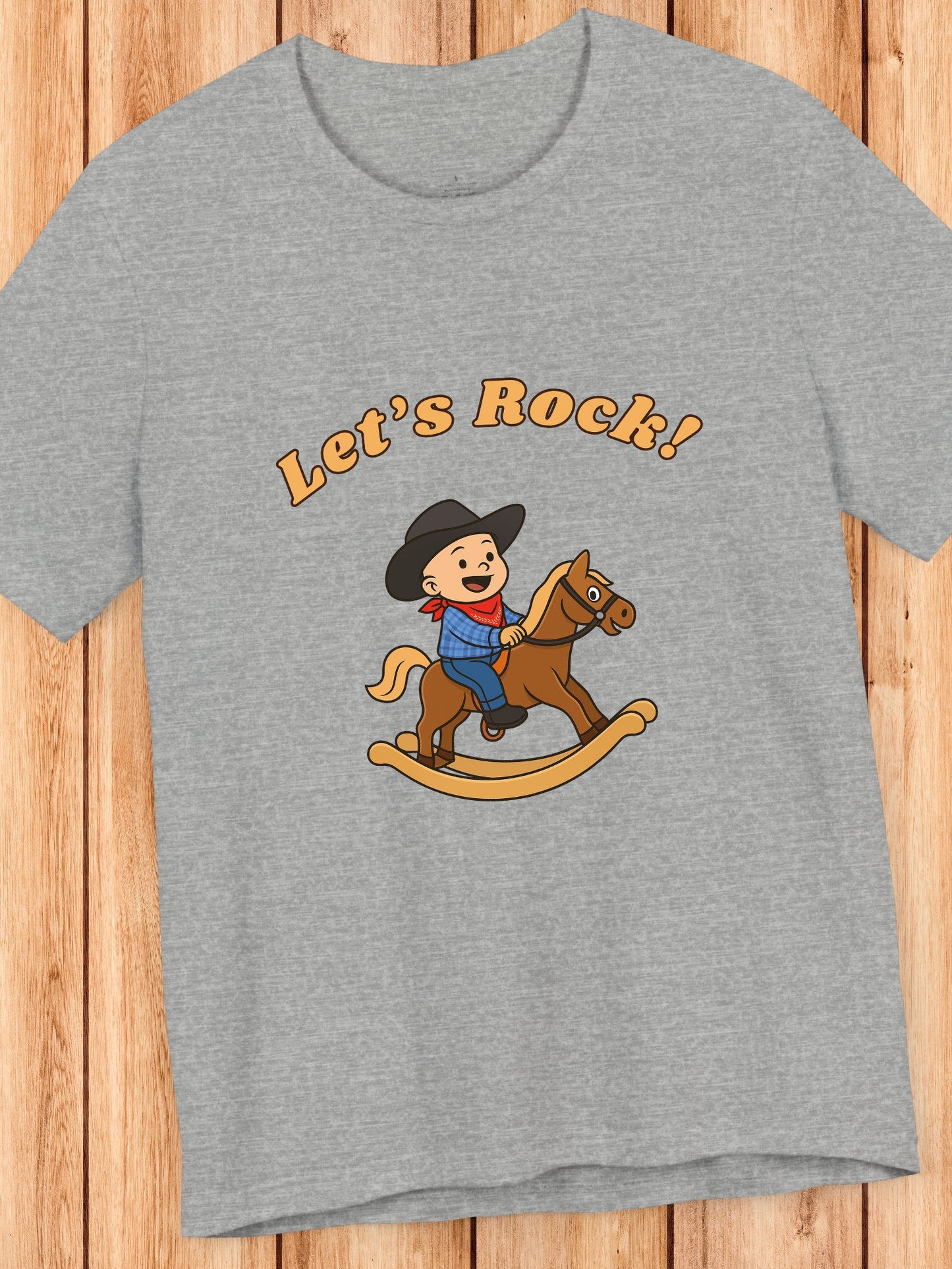 'Let's Rock!' Child Cowboy on a Rocking Horse Graphic Unisex T-Shirt, Humorous, Playful Cowboy Tee