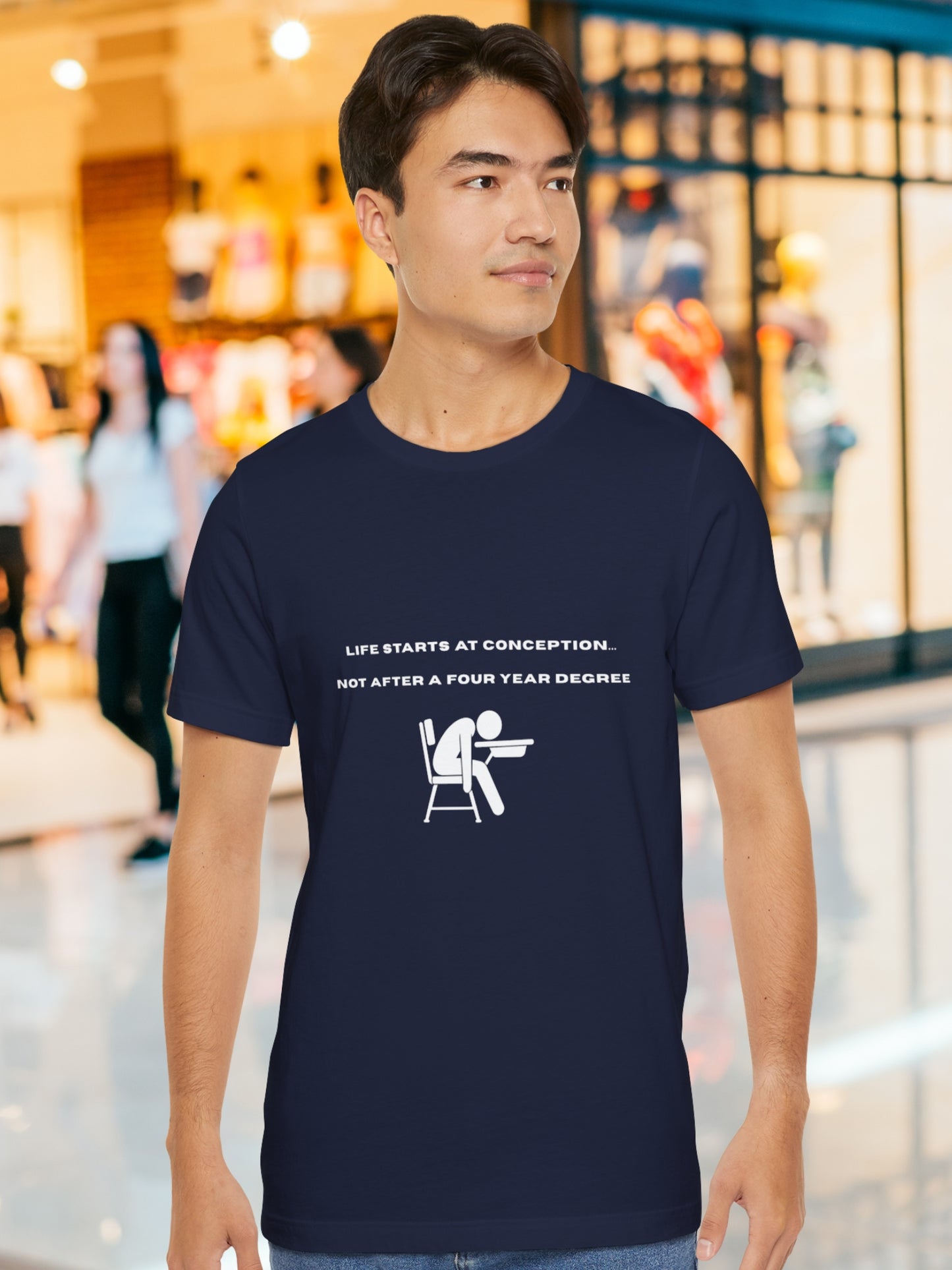 'Life Starts at Conception... Not after a Four Year Degree' Icon of a Student Dead a Their Desk Graphic Unisex T-Shirt, Anti-School Tee, Pro-Life, School is Death