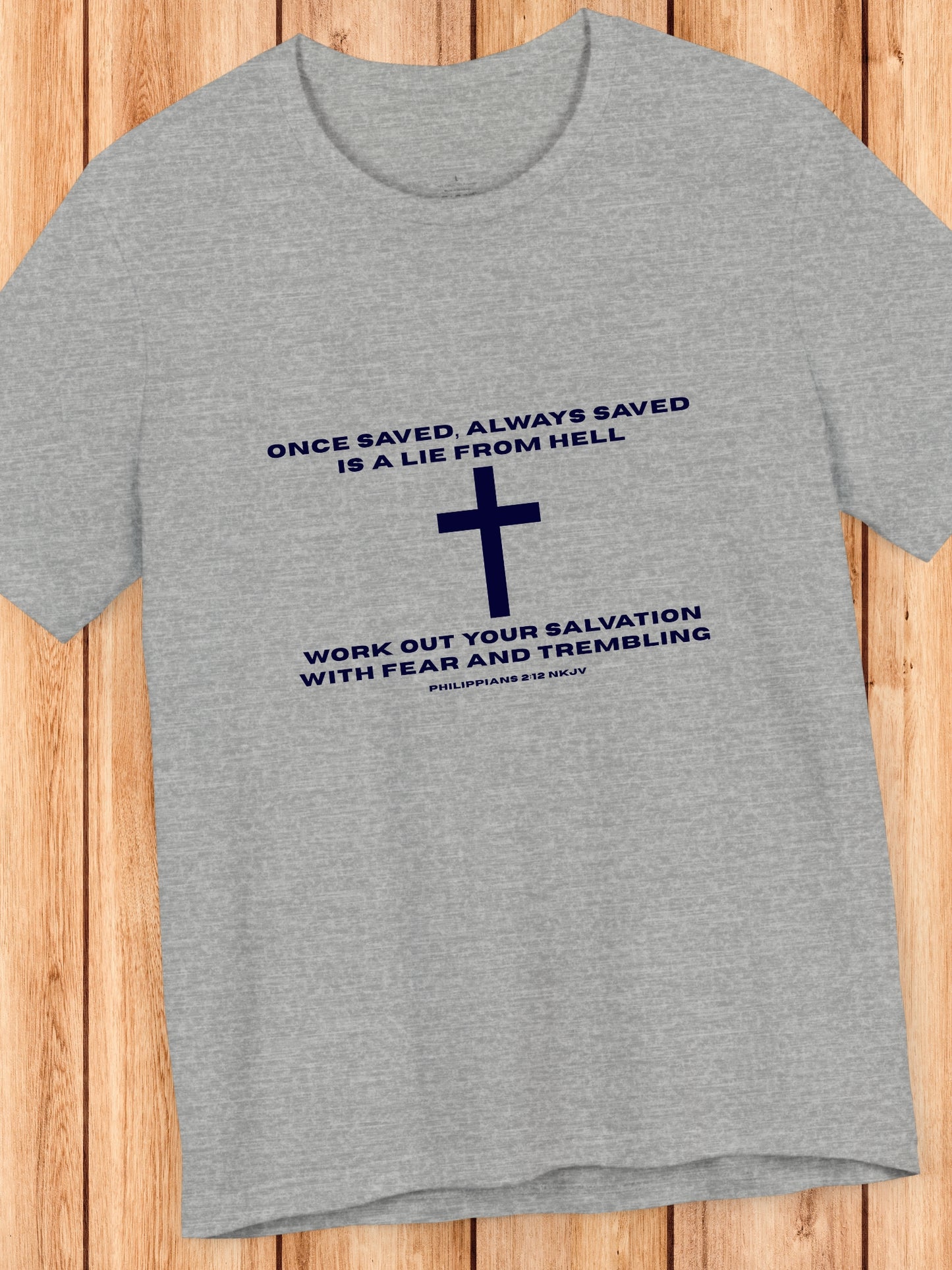 'Once saved, always saved, is a lie from hell, work out your salvation with fear and trembling Philippians 2:12 NKJV' Cross Grphic Unisex T-Shirt, Christian Tee