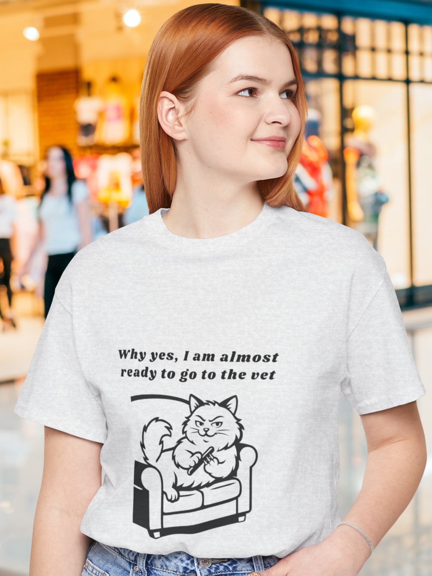 'Why yes, I am almost ready to go to the vet' Cat Sharpening its Claws Graphic Unisex T-Shirt, Humorous Cat Lover Tee