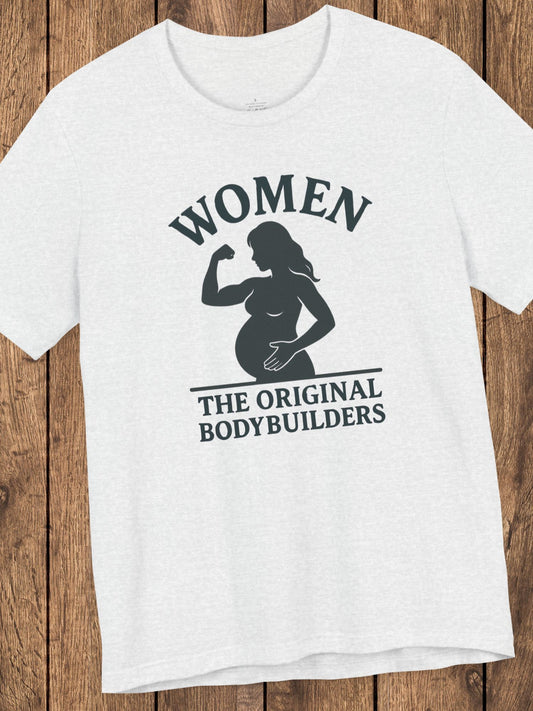'Women, The Original Bodybuilders' Pregnant Woman Flexing Graphic Unisex T-Shirt, Pregnant Women's Apparel, Strong Women's Tee