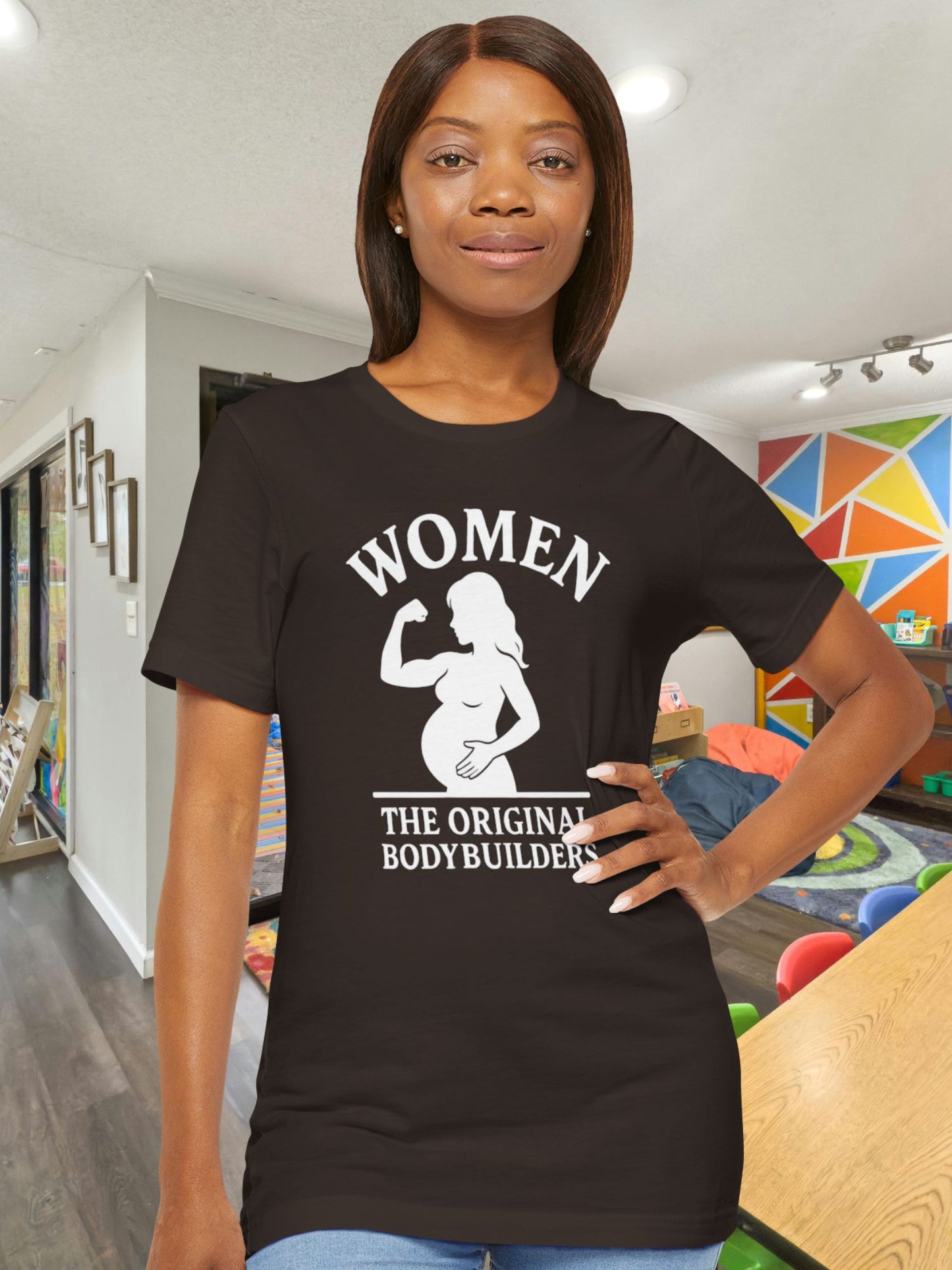 'Women, The Original Bodybuilders' Pregnant Woman Flexing Graphic Unisex T-Shirt, Pregnant Women's Apparel, Strong Women's Tee