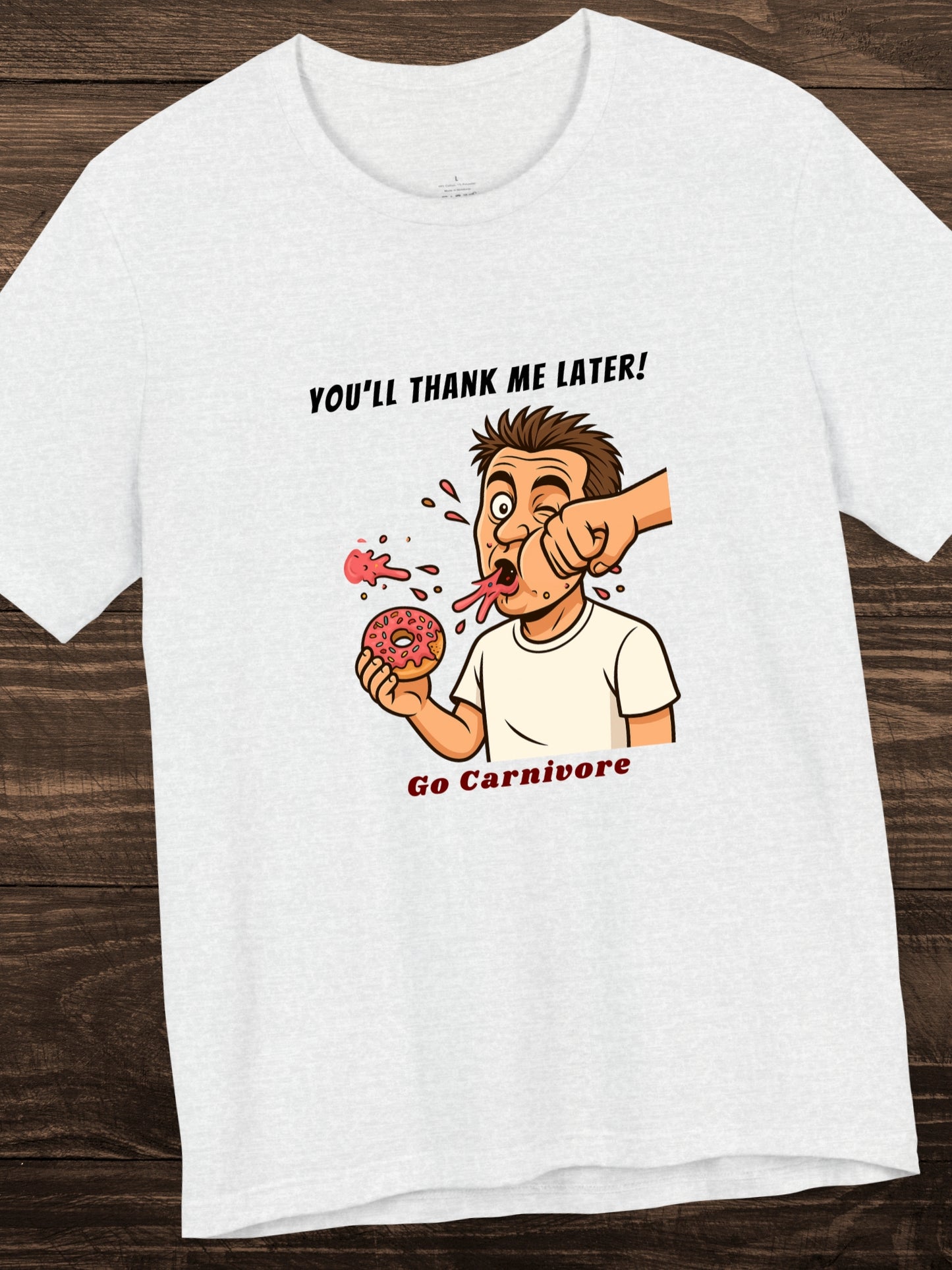 'You'll Thank Me Later! Go Carnivore' Guy Punched in the Face While Eating a Donut Graphic Unisex T-Shirt, Humorous Carnivore Diet Apparel, Health and Wellness